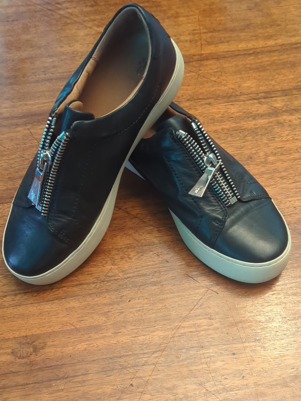 Frye Black Leather Slip-On Sneakers with Silver Zipper Detail